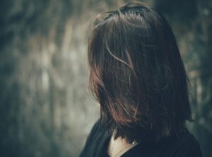 attitude girl hidden face with hair